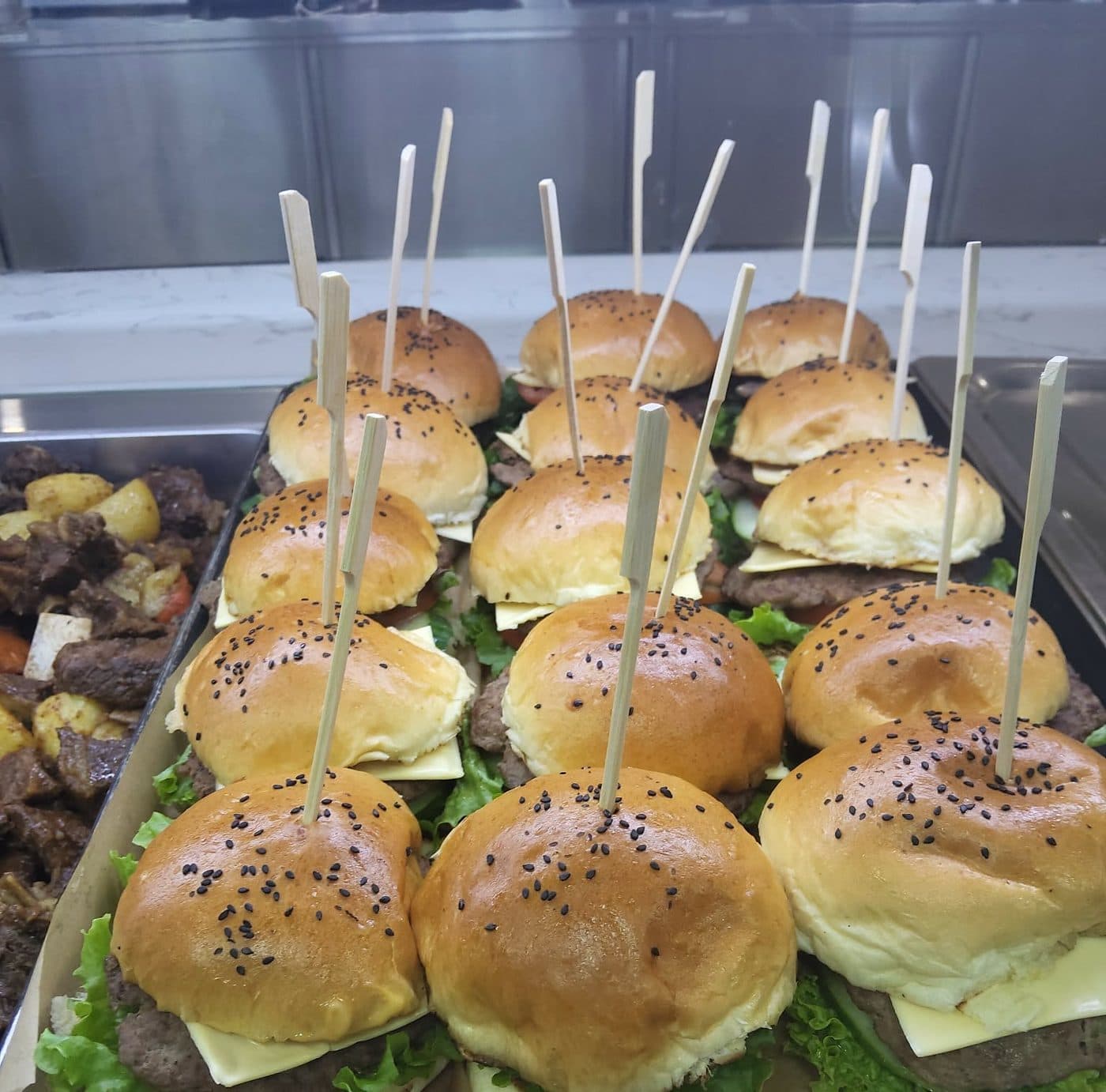 Small burgers prepared for service