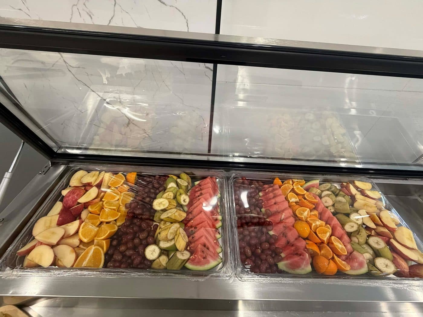 Sliced fruit arranged on the counter