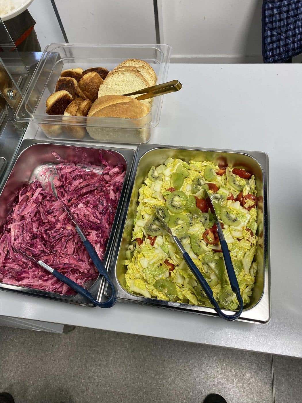 Salads and bread on the buffet line