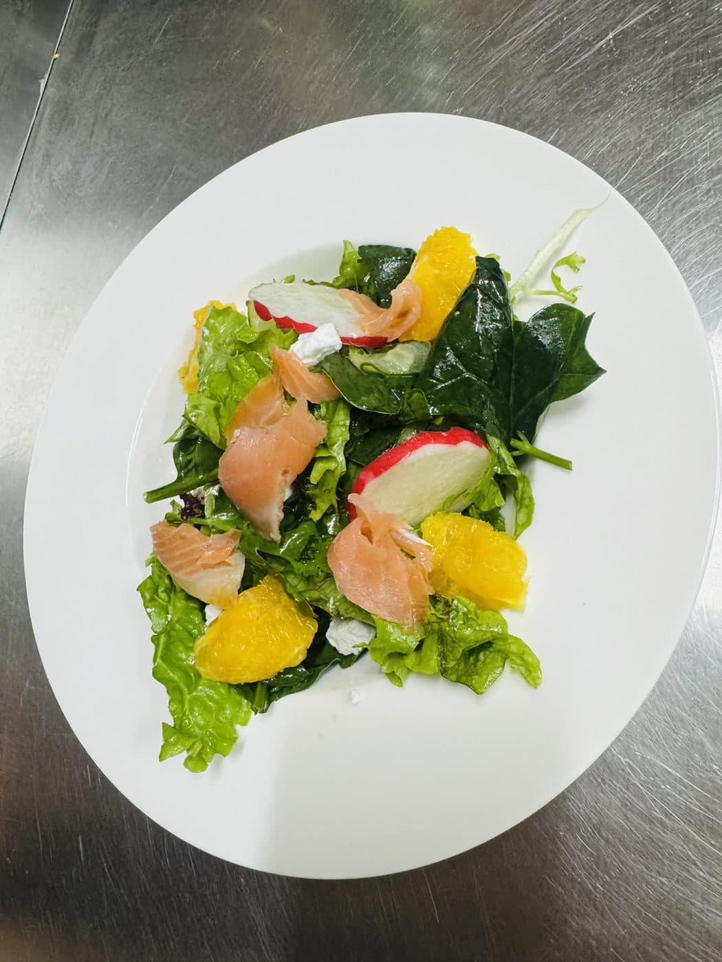 Salmon salad with orange and greens