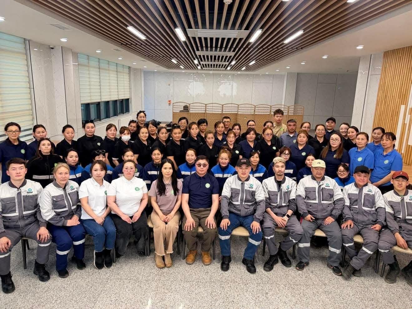 Staff gathered in a hall