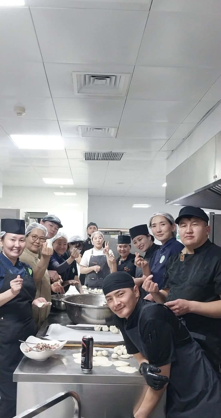 Cooks preparing food together